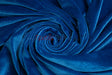 Royal blue stretch velvet spandex fabric swirled in a plush texture.