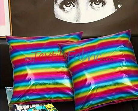 Rainbow Metallic Foil Spandex Lame | Rainbow Stretch Metallic Lame | All Over Multi Color Foil on Stretch Burgundy Knit | 60" Wide