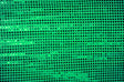 Close-up of green confetti dot sequins fabric by mytextilefabric